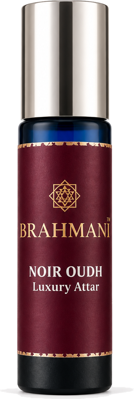 Brahmani Noir Oudh luxury attar, a maroon and gold roll-on bottle with a polished silver cap